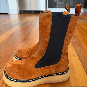 KHAITE Bleeckee Chestnut Suede Chelsea Boots with Black Elastic and Tan Sole.